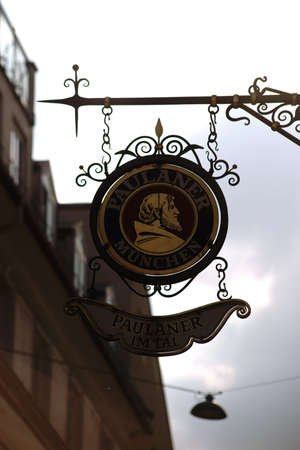Munich, Germany - June 29, 2018: The coat of arms of the Paulaner beer brewery at the entrance of a restaurant on June 29, 2018 in Munich.のeditorial素材