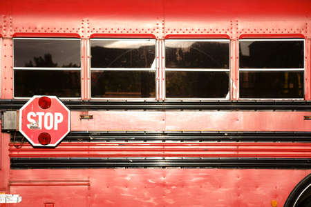 The side view on the body of a discarded school bus.