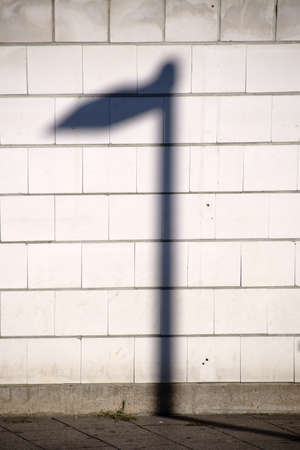 A distinctively Lantern shadow on a brick wall.の写真素材