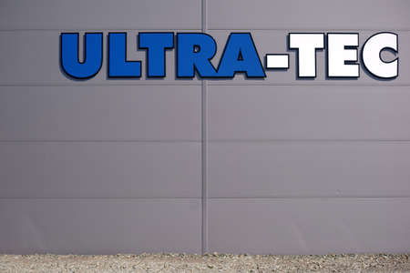 Pirmasens, Germany - March 30, 2019: The modern exterior of a business building or hall of the ultra-tec with logo on March 30, 2019 in Pirmasens.のeditorial素材