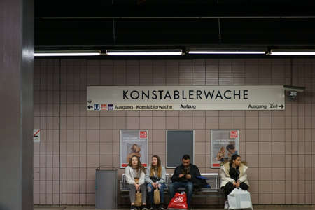 Frankfurt, Germany - March 02, 2019: People sit on the grid at the subway station Konstablerwache on March 02, 2019 in Frankfurt.のeditorial素材