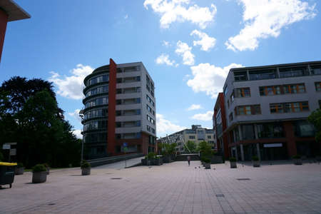 The town hall square in Bad Homburg with modern residential and commercial buildings as well as the...