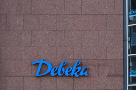 Giessen, Germany - August 13, 2019: The logo of the savings bank Debeka on the facade of a business building on August 13, 2019 in Giessen.のeditorial素材