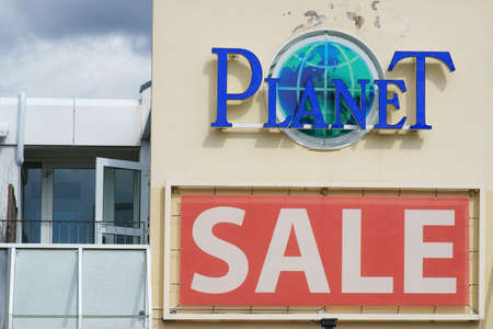 Taunusstein-Wehen, Germany - August 18, 2019: The logo of Planet Fashion's World a department store on August 18, 2019 in Taunusstein-Wehen.のeditorial素材