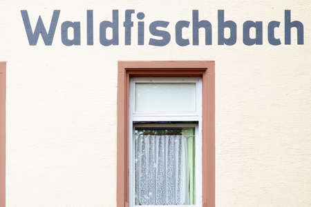 The bright wall of the Waldorfbach city station.