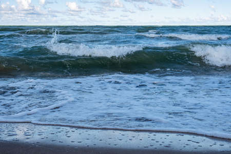 Wavy sea in summer day.