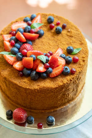 Gluten free vegan cake with different berries