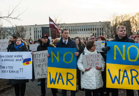RIGA, LATVIA. 24th February 2022. People protest against Russian attack on Ukraine near Embassy of...