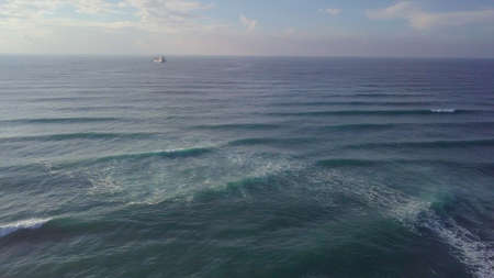 Big sea boat aerial up shot, waves and wind