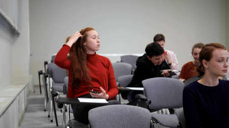 Students sit in classroom in university.の写真素材