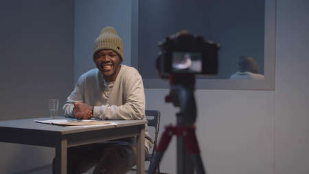 The criminal laughs in front of the cameraの写真素材