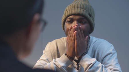The prisoner is worried in a conversation with a lawyer