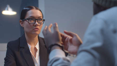 The lawyer is talking to the client. Law and Prison