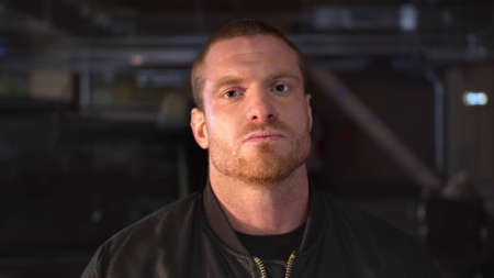 Bandit looks threateningly at the camera. Medium close upの写真素材