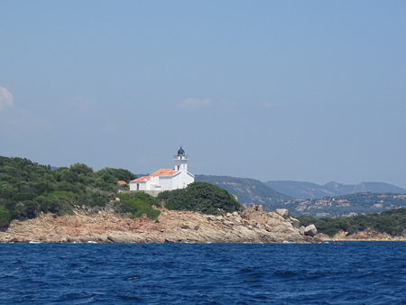Lighthouse at the entrance to the gulf of Porto Vecchio Corsicaの写真素材