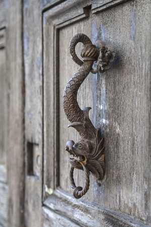 Door knocker in the form of the head of  sea monsterの写真素材