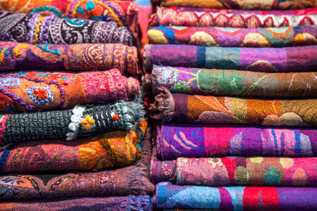 Multicolored woven into neat stacksの写真素材