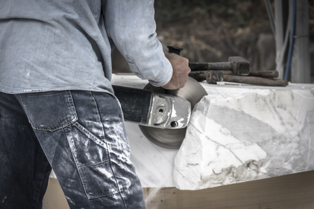 The instruments of the sculptor: gloves and hammerの写真素材