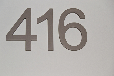 house or hotel room numbers on clear gray surface, For graphical conceptの写真素材