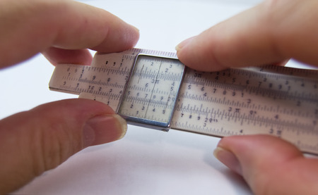 old slide rule slipstick analogue computer for mathematical calcululsの写真素材
