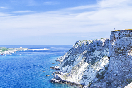 view of Tremiti islands with blue water, boats and clouds. Gargano. Puglia, Italy. for nature, travel and holyday conceptsの写真素材