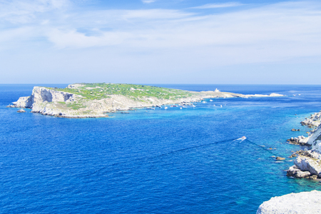 view of Tremiti islands with blue water, boats and clouds. Gargano. Puglia, Italy. for nature, travel and holyday conceptsの写真素材