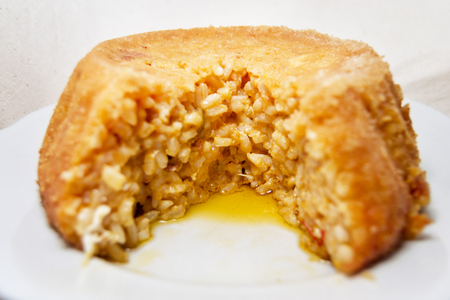 soft focus of tasty baked vegan rice bomb with rice and pumpkin - italian traditional recipeの写真素材