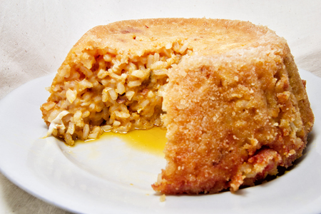 soft focus of tasty baked vegan rice bomb with rice and pumpkin - italian traditional recipeの写真素材