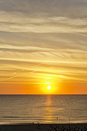 orange dawn over mediterranean sea in summer. for travel and naturalistic conceptの写真素材