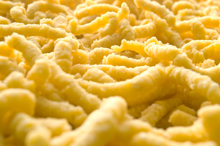 Passatelli pasta. Traditional delicious food of Modena, Emilia Romagna, Italy. Made with: eggs, bread crumbs, parmesan cheese, flour, nutmegの写真素材