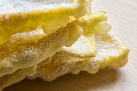 Angel wings:  traditional sweet crisp pastry for carnival time. Italian cenci, frappe, bugie or chiacchiereの写真素材