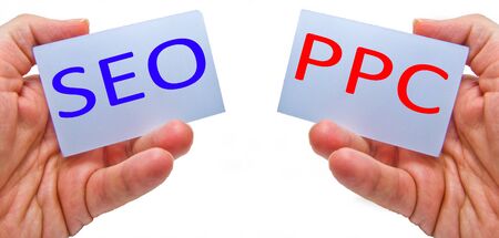 SEO versus PPC - Search Engine Optimization vs Pay Per Click -  for marketing and business conceptsの写真素材