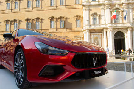 01-07-2021, Modena - Italy. Motor Valley Cars Exibition, red Maserati Ghibli in front of Italian Army Academy palace. Concept for italian style, luxury cars, technology, sportのeditorial素材