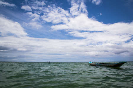 Ancient boat on tropical seaの写真素材