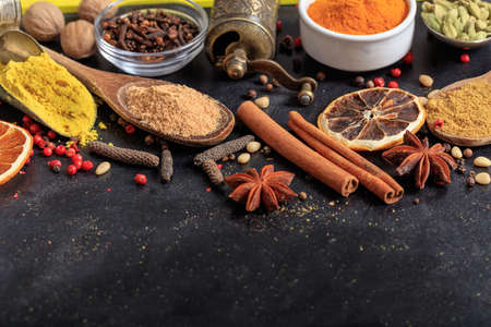Composition of various spices on a black backgroundの写真素材