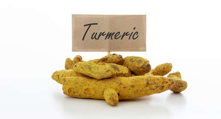 Turmeric seeds on a white backgroundの写真素材