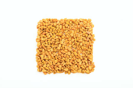 Fenugreek seeds on white backgroundの写真素材