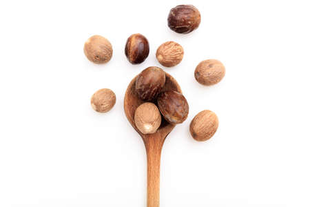 Nutmeg seeds on white background