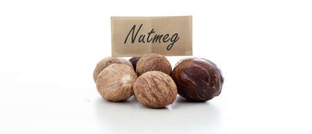 Nutmeg seeds on white backgroundの写真素材