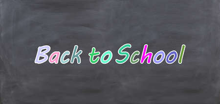 3d rendering Colored back to school on a black chalkboard