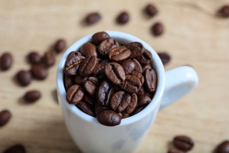 Cup full of coffee beansの写真素材