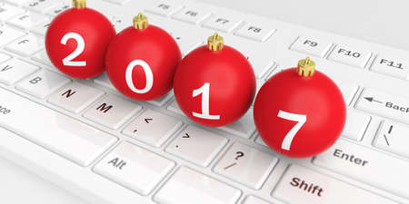 3d rendering christmas balls on a white keyboard