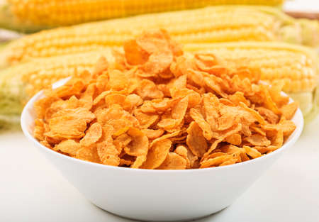 Corn flakes on white backgroundの写真素材