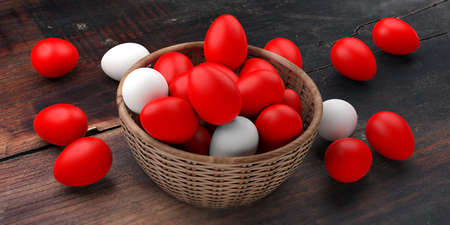 3d rendering white and red eggs in a basket on a tableの写真素材