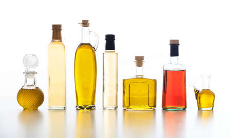 Bottles of olive oil and vinegar on white backgroundの写真素材