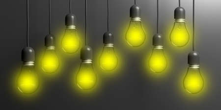 3d rendering light bulbs hanging on black backgroundの写真素材