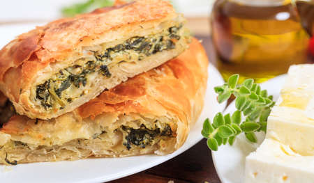 Spinach pie pieces in a plateの写真素材