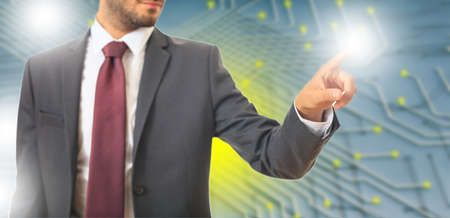 Businessman on abstract technology backgroundの写真素材