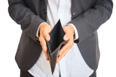 Man looking at his empty wallet