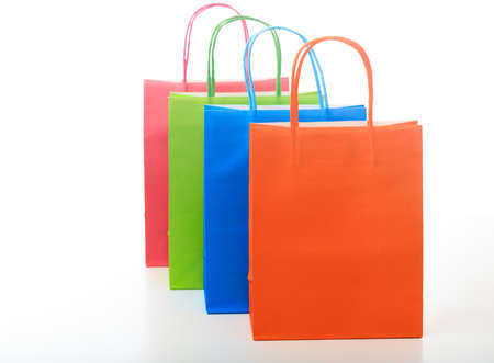 Colorful paper shopping bags on white backgroundの写真素材